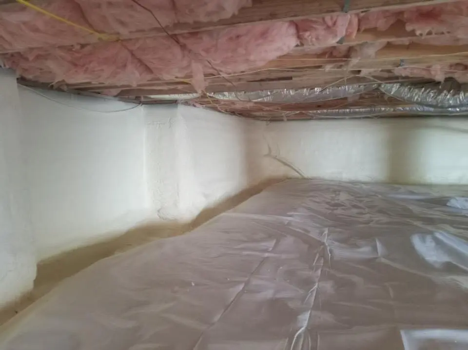 Crawl space encapsulation with closed-cell spray foam for Commercial Roof Restoration in Mechanicsburg